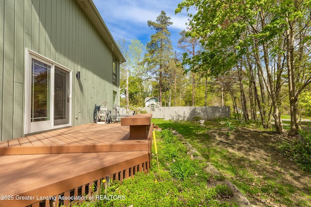 wooden deck featuring fence