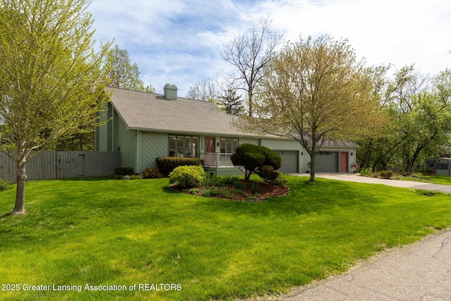 single story home featuring driveway, an attached garage, a chimney, and roof with shingles
