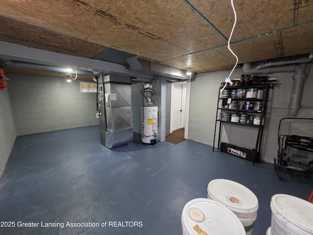 basement with water heater, concrete block wall, and heating unit