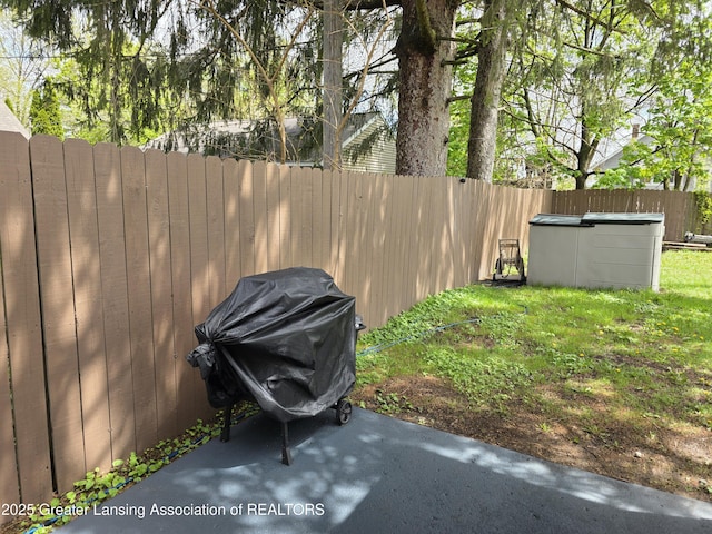 fenced backyard featuring a swimming pool