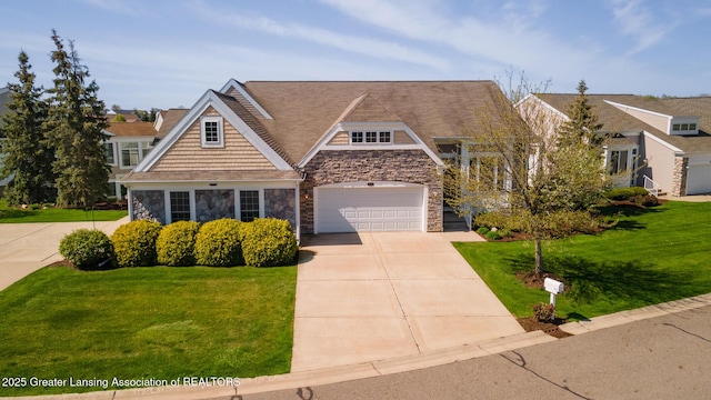 craftsman house with stone siding, driveway, a front lawn, and a garage