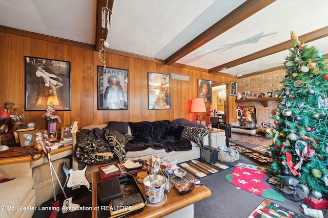 living area featuring beamed ceiling and wood walls