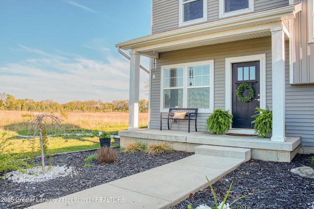 property entrance featuring a porch