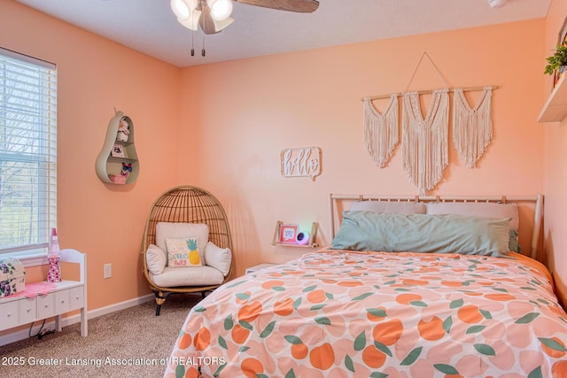 bedroom featuring carpet flooring, baseboards, and ceiling fan