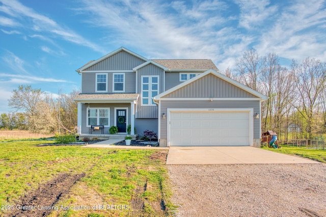 view of front facade with driveway, board and batten siding, an attached garage, and a front yard
