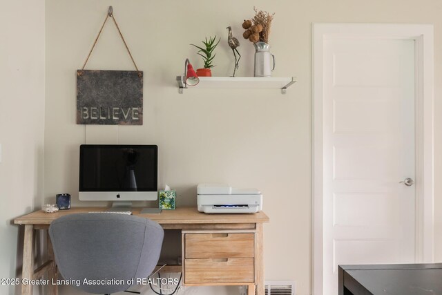 office area featuring built in study area