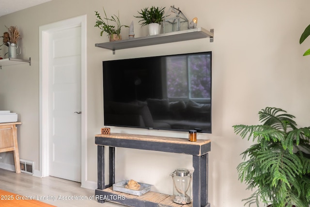 detailed view of wood finished floors and baseboards