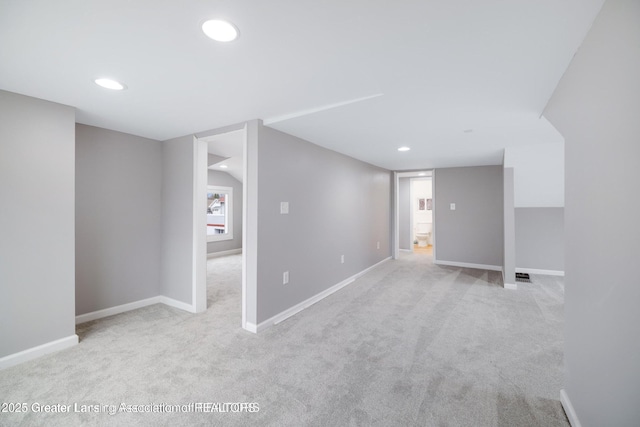 1416 Vermont Ave, Lansing, MI 48906 - below grade area featuring carpet, baseboards, and recessed lighting