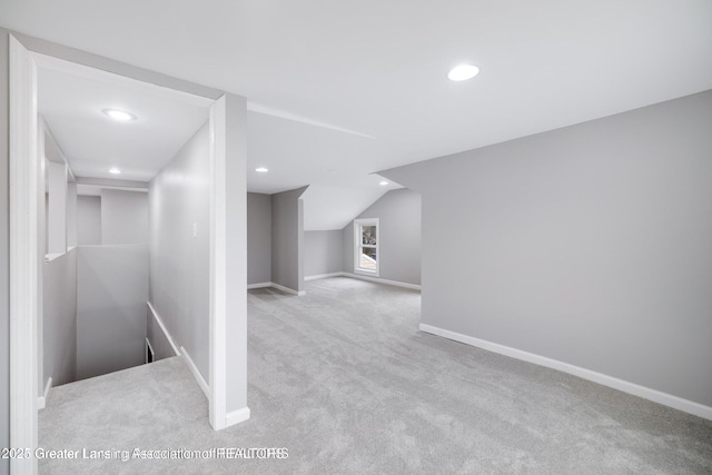 1416 Vermont Ave, Lansing, MI 48906 - additional living space with carpet flooring, baseboards, recessed lighting, and lofted ceiling