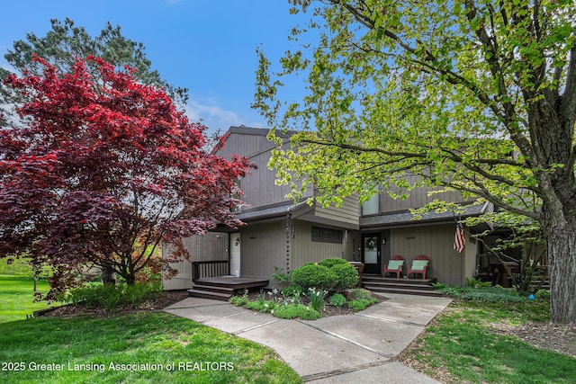 5431 Wild Oak Dr, East Lansing, MI 48823 - view of front of home featuring a front lawn