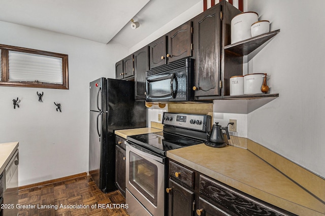 5431 Wild Oak Dr, East Lansing, MI 48823 - kitchen featuring black appliances, open shelves, light countertops, and baseboards