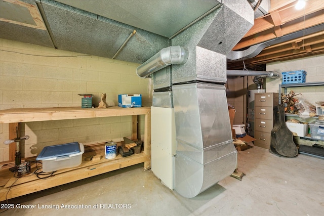 utility room with heating unit