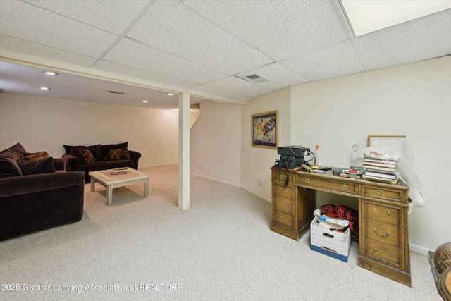 home office featuring a paneled ceiling, carpet flooring, recessed lighting, and baseboards