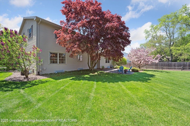back of house with a patio area