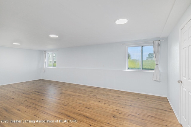 6669 Cotswald Dr Unit 126, Grand Ledge, MI 48837 - spare room featuring light wood-style flooring, baseboards, and recessed lighting