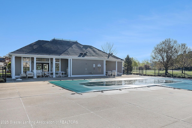 6669 Cotswald Dr Unit 126, Grand Ledge, MI 48837 - community pool with fence, a patio area, and french doors