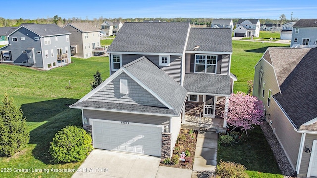 6669 Cotswald Dr Unit 126, Grand Ledge, MI 48837 - aerial view of residential area