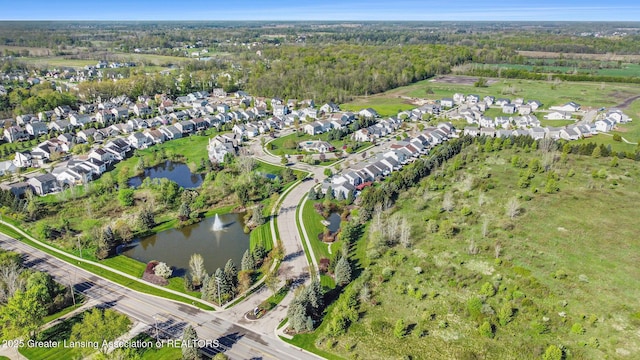 6669 Cotswald Dr Unit 126, Grand Ledge, MI 48837 - view of property location with a large body of water and nearby suburban area