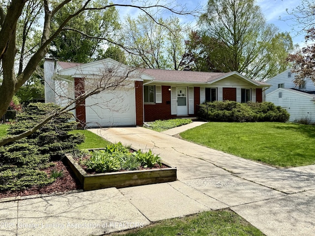ranch-style home with driveway, brick siding, an attached garage, a front lawn, and a chimney