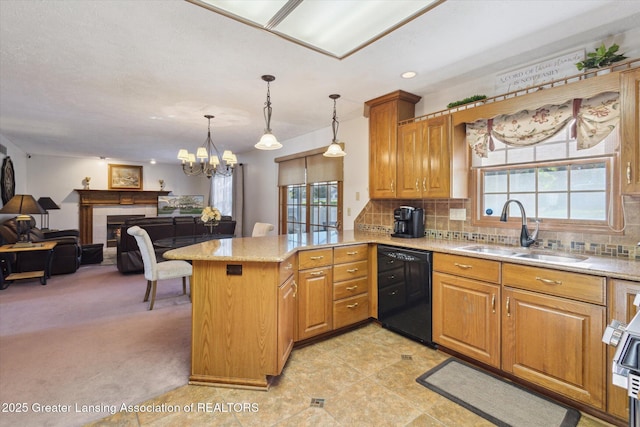 900 Oneida Woods Trl, Grand Ledge, MI 48837 - kitchen featuring a sink, black dishwasher, a peninsula, light stone counters, and decorative backsplash