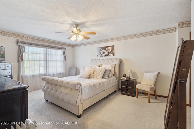 900 Oneida Woods Trl, Grand Ledge, MI 48837 - bedroom featuring light colored carpet, a textured ceiling, and ceiling fan