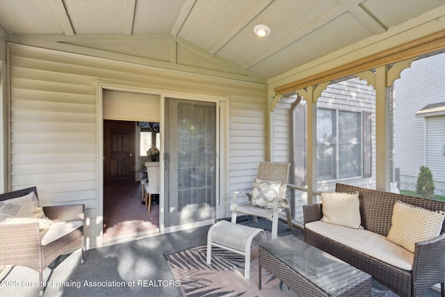 900 Oneida Woods Trl, Grand Ledge, MI 48837 - sunroom / solarium featuring lofted ceiling and an outdoor hangout area