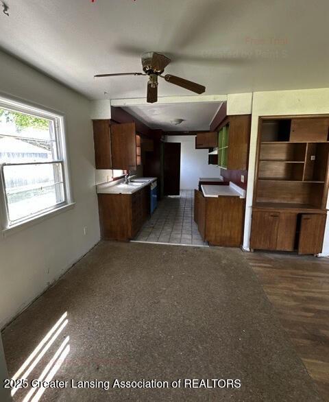 2623 Lafayette Ave, Lansing, MI 48906 - kitchen with ceiling fan and a sink