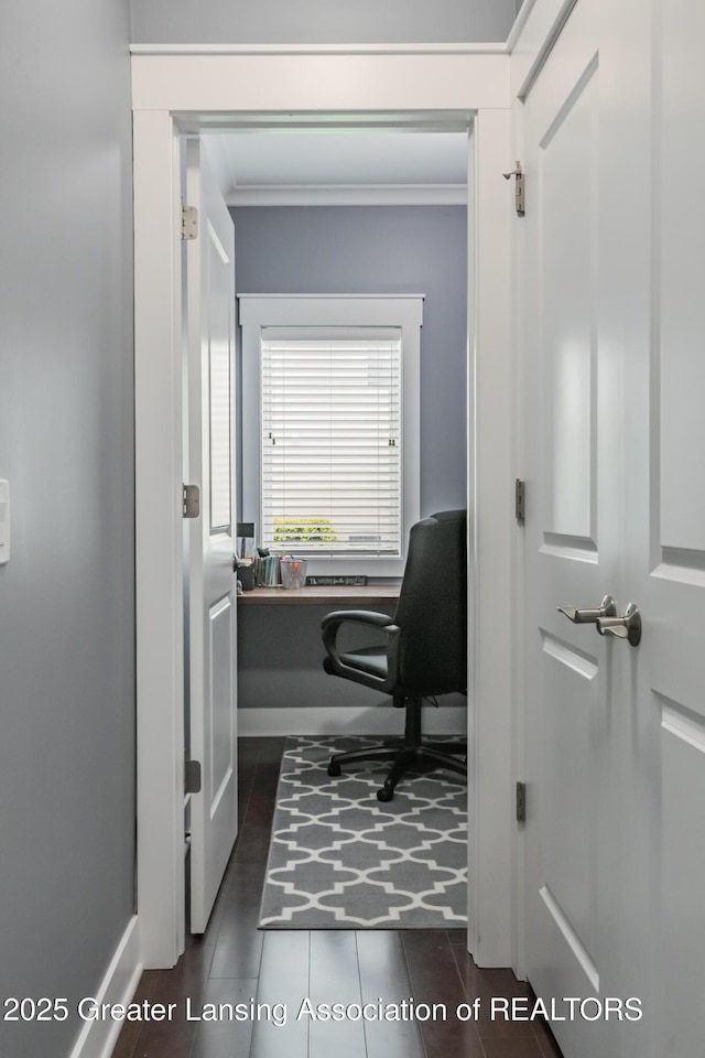 office featuring ornamental molding, dark tile patterned flooring, and baseboards