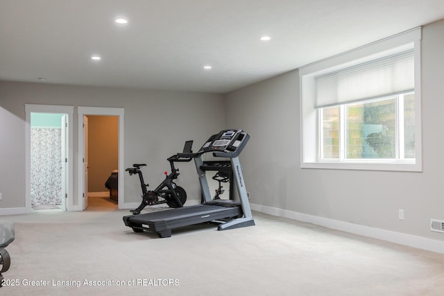 workout area featuring carpet floors, baseboards, and recessed lighting