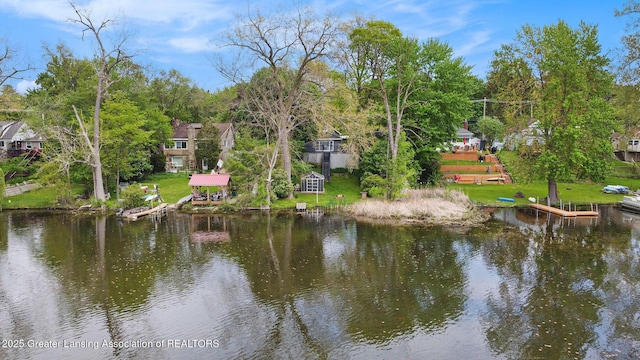 15496 Park Lake Rd, East Lansing, MI 48823 - water view featuring a tree filled landscape