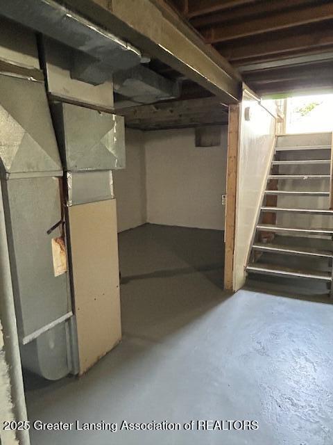 1209 Hapeman St, Lansing, MI 48915 - below grade area with stairway and heating unit