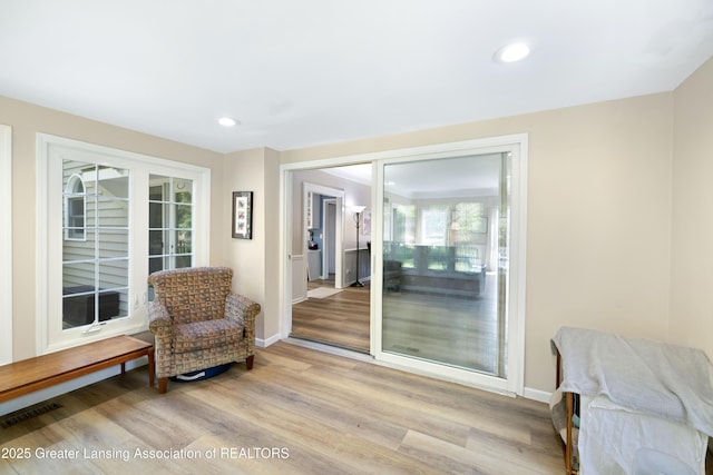 2038 Woodfield Rd, Okemos, MI 48864 - sitting room featuring light wood finished floors, recessed lighting, and baseboards