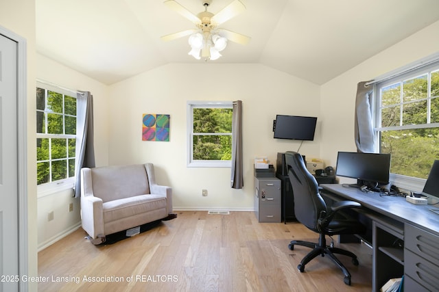 2038 Woodfield Rd, Okemos, MI 48864 - office area featuring light wood-style flooring, vaulted ceiling, plenty of natural light, a ceiling fan, and baseboards