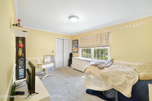 2038 Woodfield Rd, Okemos, MI 48864 - bedroom featuring crown molding, carpet floors, a closet, and a desk