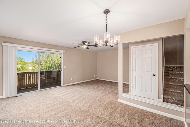 1626 Pepper Tree Ln Unit 13, Lansing, MI 48912 - carpeted empty room featuring a chandelier, baseboards, and ceiling fan