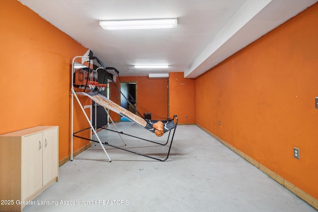 exercise area with baseboards