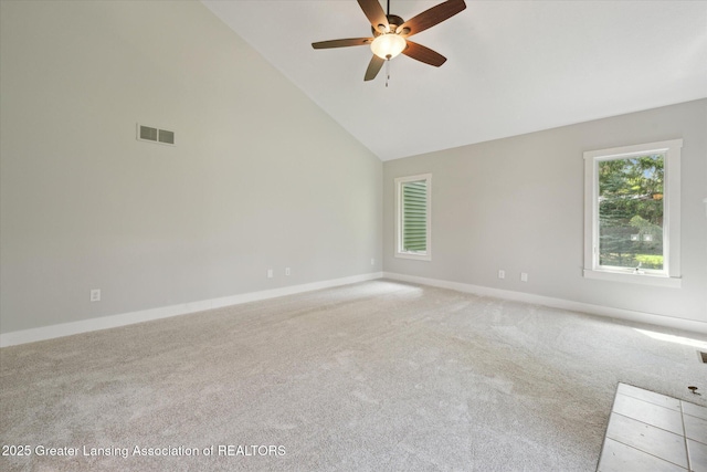 263 E Sherwood Rd, Williamston, MI 48895 - unfurnished room featuring light carpet, a ceiling fan, baseboards, and high vaulted ceiling