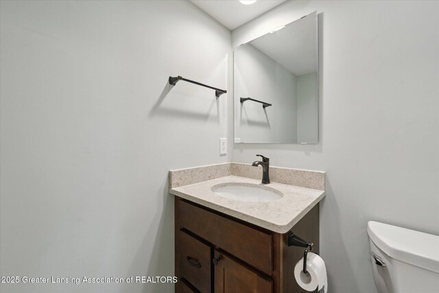 263 E Sherwood Rd, Williamston, MI 48895 - bathroom with vanity and toilet