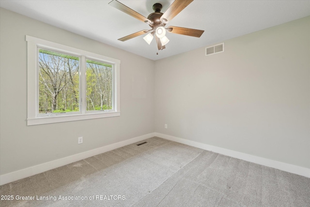 263 E Sherwood Rd, Williamston, MI 48895 - carpeted empty room with baseboards and a ceiling fan