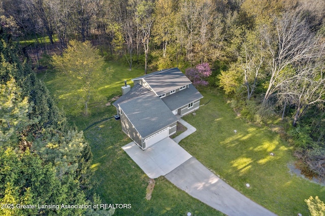 263 E Sherwood Rd, Williamston, MI 48895 - aerial view of property and surrounding area with a heavily wooded area