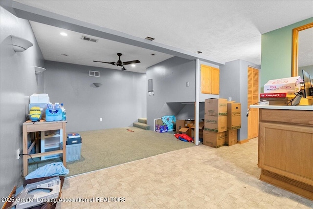 playroom featuring a ceiling fan, light flooring, light carpet, and recessed lighting