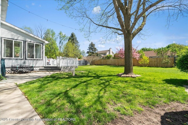 view of yard with a deck