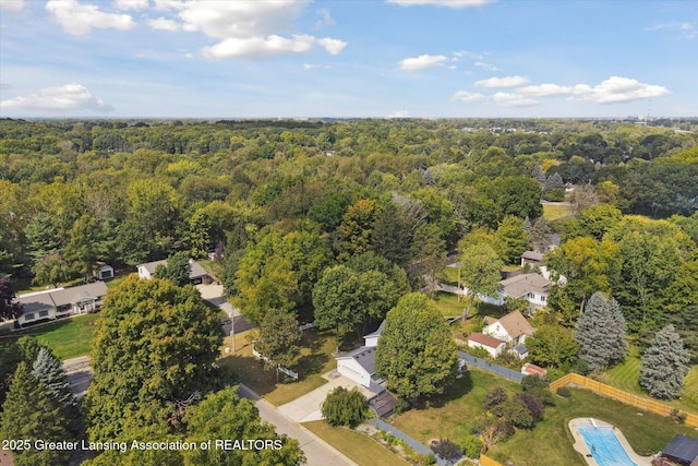 drone / aerial view of a heavily wooded area