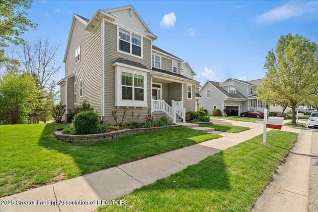 3837 Plover Pl, East Lansing, MI 48823 - traditional-style house featuring a front lawn