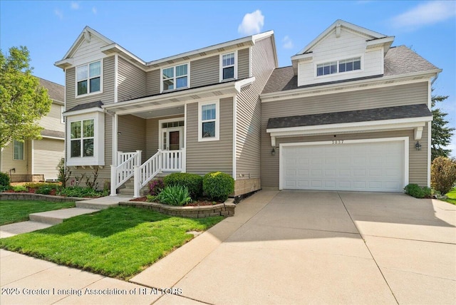 3837 Plover Pl, East Lansing, MI 48823 - view of front of house featuring a shingled roof, an attached garage, concrete driveway, and a front lawn