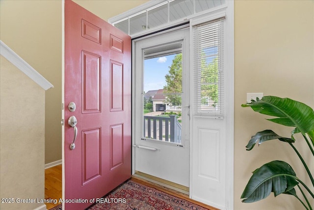 3837 Plover Pl, East Lansing, MI 48823 - foyer entrance featuring wood finished floors