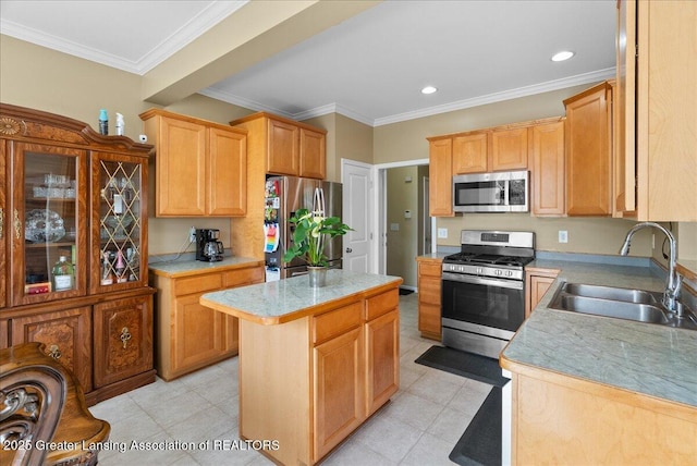 3837 Plover Pl, East Lansing, MI 48823 - kitchen featuring appliances with stainless steel finishes, a sink, a kitchen island, light countertops, and light tile patterned floors
