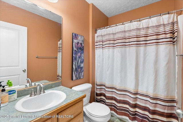 3837 Plover Pl, East Lansing, MI 48823 - full bath featuring toilet, vanity, a textured ceiling, and curtained shower