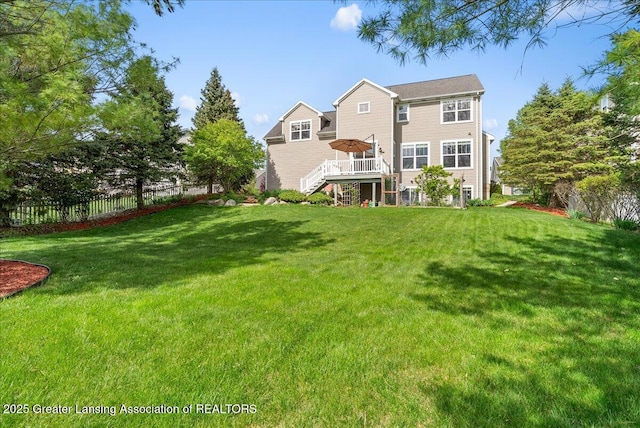 3837 Plover Pl, East Lansing, MI 48823 - rear view of property featuring stairway and a wooden deck