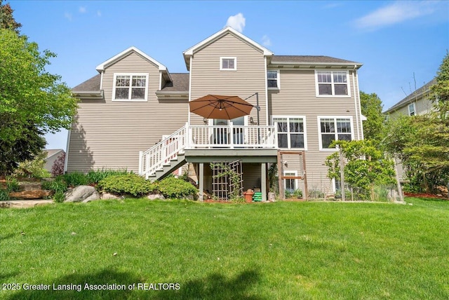 3837 Plover Pl, East Lansing, MI 48823 - back of house with stairway, a wooden deck, a lawn, and roof with shingles